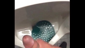 Latino masturbates in public bathroom
