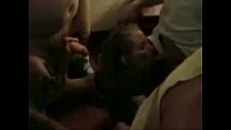 Nice girl giving a blowjob at a party