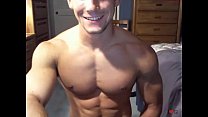 Muscle boy masturbates in his bedroom