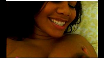 Trini girl sucking her own breasts