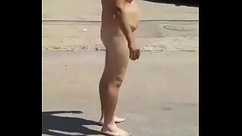 man running naked in the street