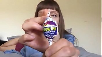 beauty sucking and slurping lollipop and chewing gum