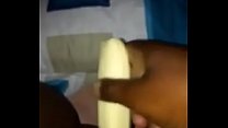 ugandan girl carol uses a banana