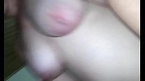 Young busty girl smearing the male's cock