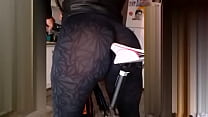 ass in shoes on top of bike