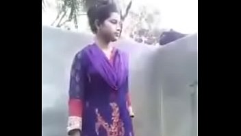 Village girl showing milk