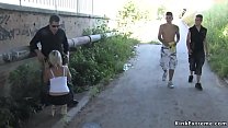 Handcuffed blonde sucking dicks outdoor