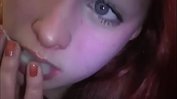 Married redhead playing with cum in her mouth
