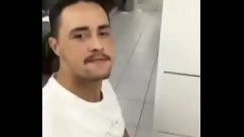 Passive sucking my cock in a public bathroom in a shopping center in Medellín