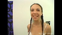 Brunette in pigtails uses a toy on her hairy pussy