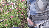 Leather biker wanking and cumming at the roadside - Biker jacking off and cumming on the roadside