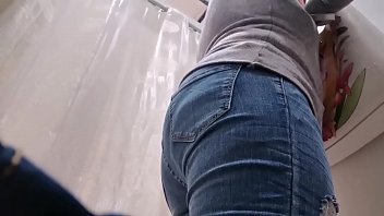 Your slutty Italian tries on jeans while wearing a butt plug in her ass