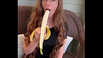 redhead sucking banana