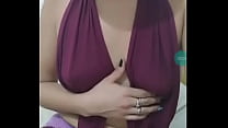 Young girl showing her breasts on the live
