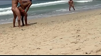 follar en la playa