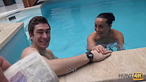 HUNT4K. Slim brunette has sex with stranger by the pool near her man
