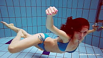 Tight blue swimsuit babe Martina in the pool