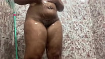 Brunette dancing funk while taking a shower!
