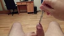 Small penis plug is fully inside pushed by the other cock sounding rod