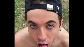 Twink swallows cum outdoors