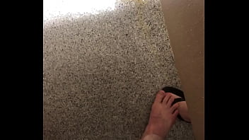 submissive handjob under shower stall at YMCA