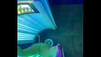 Ally White masturbates in tanning booth
