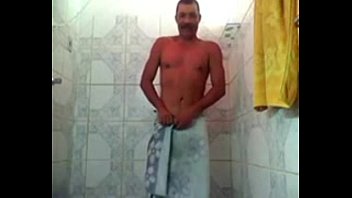 Mature taking a shower